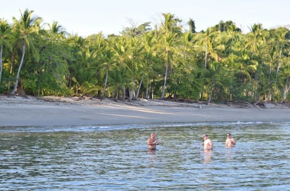 Sport Fish Panama Island Lodge clients swimming near our beach