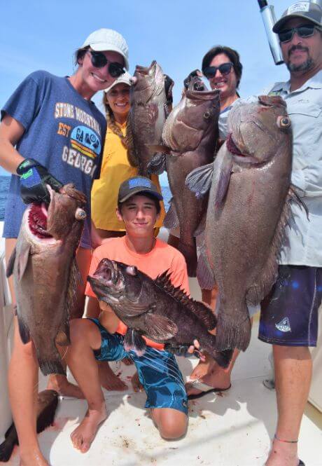 Warner family and friends posing with catch at Sport Fish Panama Island Lodge