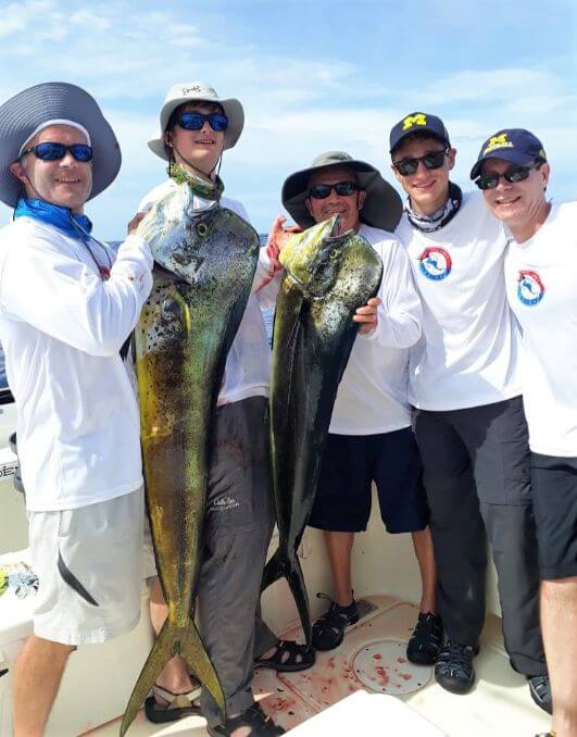 Group of anglers posing with Dorado, also known as ‘Mahi-Mahi’ or ‘Dolphin’