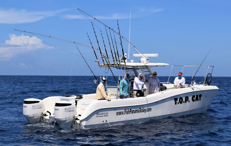 Angler on a Sport Fish Panama Island Lodge World Cat fighting a fish